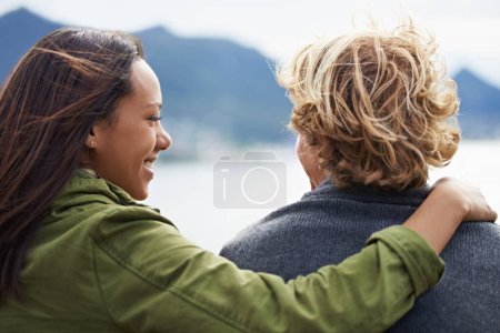 Photo for Sharing a spectacular view together. an attractive young couple enjoying a day outdoors together - Royalty Free Image