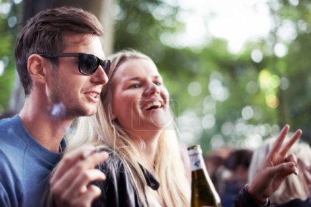Photo for Theyre avid festival goers. a happy young couple enjoying an outdoor festival together - Royalty Free Image
