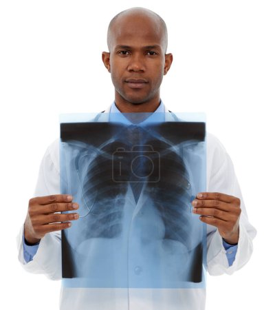 Photo for Taking a closer look at your lungs. A radiologist looking at an x-ray - Royalty Free Image
