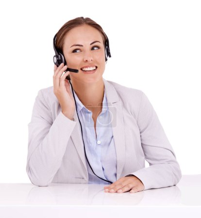 Photo for Let me me see what I can do to help...Professional call center agent working while wearing a headset - isolated on white - Royalty Free Image