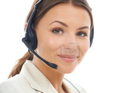 Photo for Friendly customer service. A close-up studio shot of an attractive young receptionist wearing a headset, isolated on a white background - Royalty Free Image