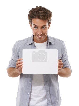 Photo for What do you think of this copyspace. Portrait of a handsome young man holding a sign for your copyspace - Royalty Free Image
