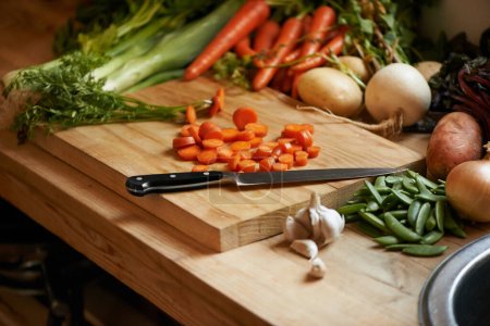 Photo for Fresh from the earth. a variety of vegetables and a knife on a cutting board - Royalty Free Image