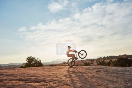 Photo for Nothing fun ever came from comfort zones. a young man out mountain biking during the day - Royalty Free Image