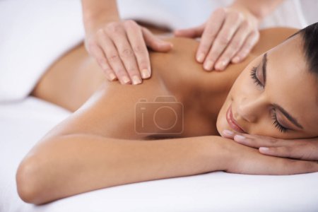 Relax, spa and woman with wellness, massage and luxury treatment with stress relief, smile and joy. Client, female person and lady with hands, employee and skincare with grooming, zen and self care.