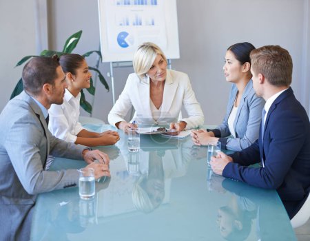 Photo for Business people in a meeting, teamwork and discussion in conference room with diversity in corporate group. Men, women and female team leader with conversation, data analytics and collaboration. - Royalty Free Image