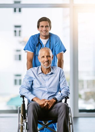 Photo for Here to make life easier for him. Portrait of a male nurse caring for a senior patient in a wheelchair - Royalty Free Image