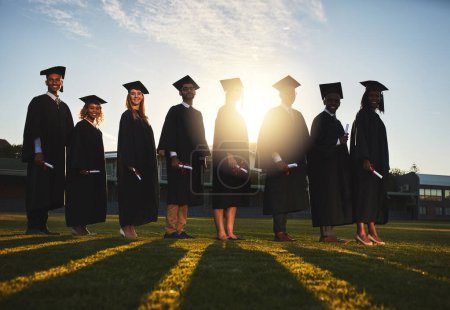 Photo for You made it. a group of university students standing together on graduation day - Royalty Free Image