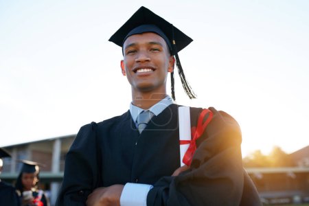 Photo for Believe and you will achieve. Portrait of a university student on graduation day - Royalty Free Image