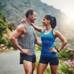 Fitness love. a young attractive couple training for a marathon outdoors