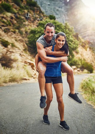 Photo for Im her weights. a young attractive couple training for a marathon outdoors - Royalty Free Image