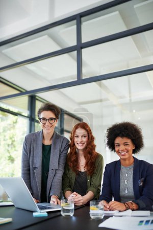 Photo for Were confident in our ability to succeed. Portrait of three young creatives working together in a modern office - Royalty Free Image