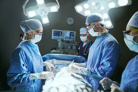 Photo for This job is life or death. surgeons in an operating room - Royalty Free Image