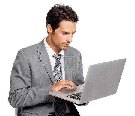 Photo for Laptop, business man and focus isolated on a transparent, png background for online review, report and analysis. Serious, planning and typing of professional person or corporate worker on computer. - Royalty Free Image
