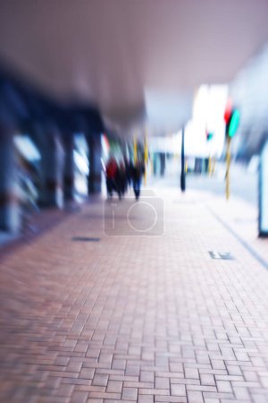 Photo for Motion blurred city life. Motion and lens blurred photo of city people - Royalty Free Image