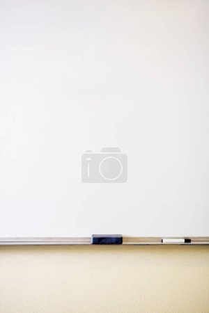 Photo for Education, learning and mockup with whiteboard in classroom for school, study and scholarship. College, teaching and academy with closeup of empty board for knowledge, information and lesson. - Royalty Free Image