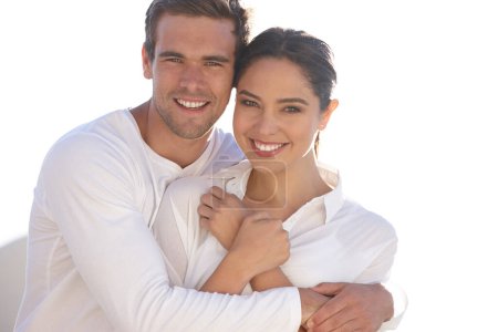 Foto de Es toda mía. una atractiva pareja joven vestida de blanco - Imagen libre de derechos