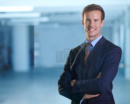 Photo for Ready to take on the corporate world. A young businessman standing and looking confidently at the camera with his arms folded - Royalty Free Image