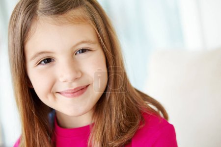 Photo for Shes creative and confident. Closeup portrait of a cute young girl smiling at you alongside copyspace - Royalty Free Image