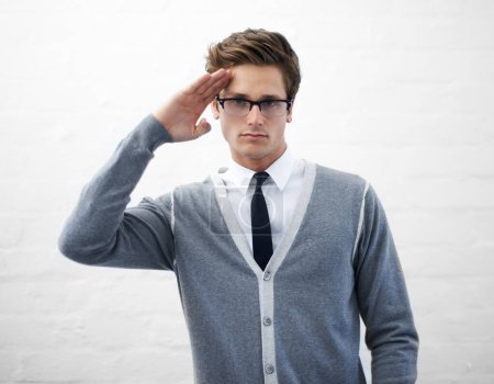 Photo for I salute your technical knowledge. A handsome young nerd saluting you - Royalty Free Image