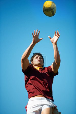 Photo for This game requires concentration. a young rugby player catching the ball during a lineout - Royalty Free Image