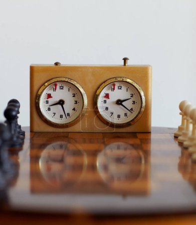 Photo for Chess sport, timer and clock for challenge isolated on a white background mockup in studio. Game, board and countdown for time, alarm and tactical competition for strategy, logic and vintage watch - Royalty Free Image