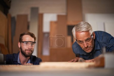 Photo for They never dreamed of success, they worked for it. a father and son working together in a workshop - Royalty Free Image