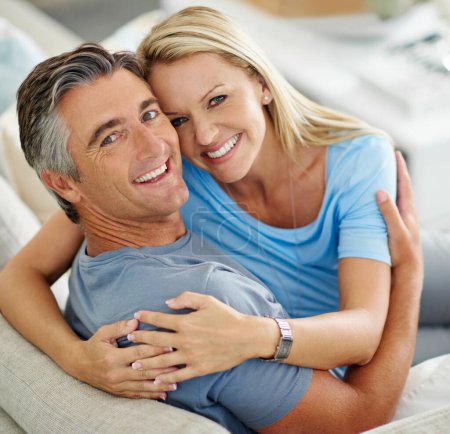 Photo for Life couldnt get any better. Portrait of a loving mature couple relaxing at home - Royalty Free Image