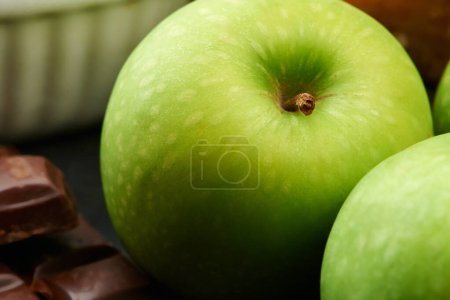 Photo for You are the apple of my eye. Studio shot of green apples on a table - Royalty Free Image