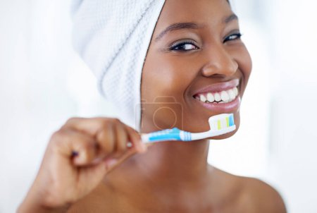 Photo for Shes got a winning smile. a beautiful young woman during her daily beauty routine - Royalty Free Image