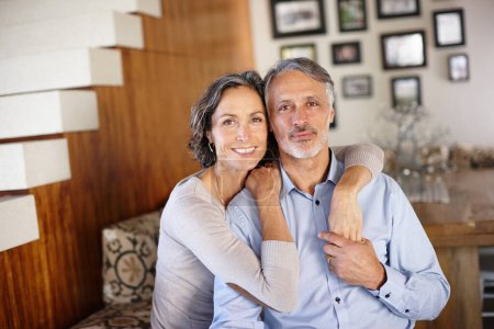 Photo for Spending a long life together. Portrait of a mature couple indoors - Royalty Free Image