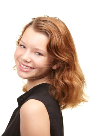 Photo for Youthful exuberance. Studio shot of a pretty young teen isolated on teen - Royalty Free Image