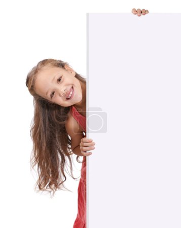 Photo for Put your message here. A little girl holding a blank placard for copyspace - Royalty Free Image