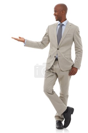 Photo for Your business has his backing. An Africab-American businessman gesturing towards copyspace - Royalty Free Image