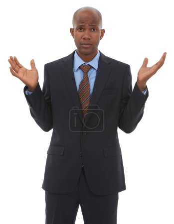 Foto de Decisiones difíciles. Un hombre de negocios afroamericano de pie interrogativamente con las manos en el aire - Imagen libre de derechos