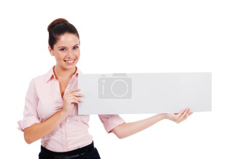 Photo for Presenting your message. an attractive young women holding up a blank banner isolated on white - Royalty Free Image
