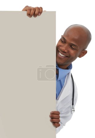 Téléchargez les photos : J'endosse votre message de santé. Un jeune homme médecin debout derrière une planche réservée au copyspace - en image libre de droit