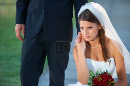 Photo for Hell always be by my side. a beautiful young bride holding her new husbands had tenderly - Royalty Free Image