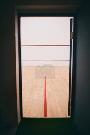 Photo for Were waiting for you. the entrance to an empty squash court - Royalty Free Image