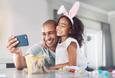 Photo for The standard against which she will judge all men. a father and daughter taking a selfie at home - Royalty Free Image