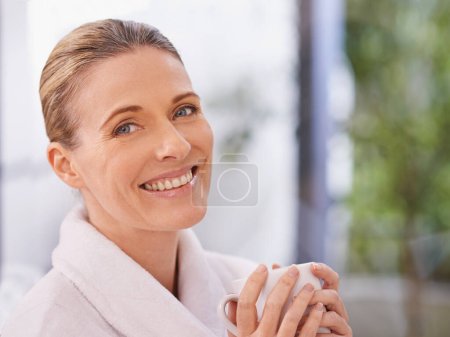 Photo for What a great way to wake up. a mature woman enjoying a cup of coffee outside - Royalty Free Image