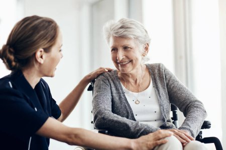 Photo for I feel good thanks to you. a female nurse caring for a senior woman in a wheelchair - Royalty Free Image