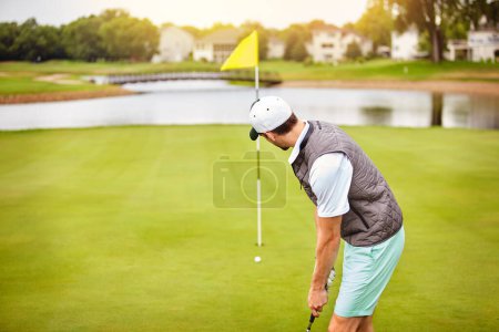 Photo for Taking a swing at life. a young man out playing golf on the golf course - Royalty Free Image