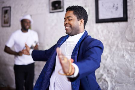 Photo for Hes putting on quite the show. a handsome performer dancing at an event - Royalty Free Image
