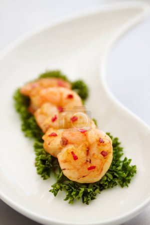 Photo for Closeup parsley and prawn with nutrition, health and protein with healthy lifestyle, delicious and meal. Zoom, seafood on a plate and luxury fine dining with food, restaurant and expensive appetizer. - Royalty Free Image