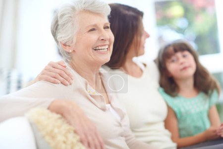 The best thing about memories is making them. an elderly woman spending time with her daughter and granddaughter at home Poster 655734756
