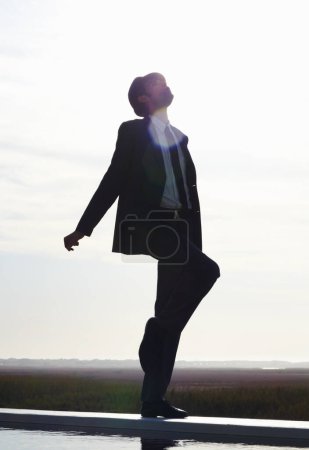 Photo for Dance, sky and freedom of man in suit and silhouette whistle with energy, dancing and happiness in nature. Dancer, happy and male person in professional clothes on mockup background for performance. - Royalty Free Image