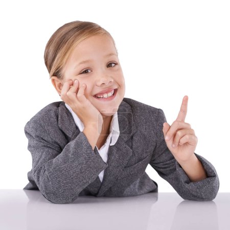 Photo for Shes dreaming big already. STudio shot of a cute little girl dressed like a businessperson - Royalty Free Image