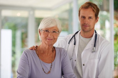 Photo for I know I have the best medical care. Portrait of a positive senior woman and her caring doctor - Royalty Free Image