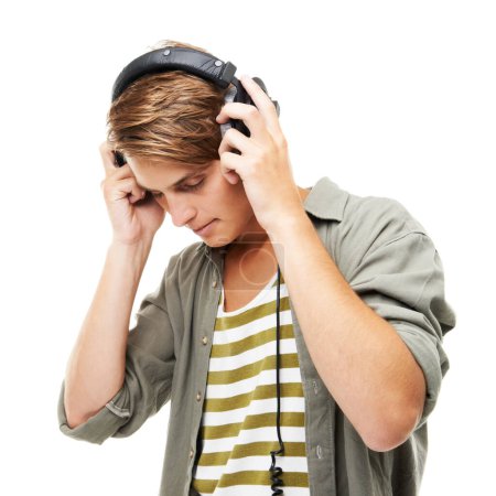 Photo for This song comes with a lot of memories. a young man listening to music - Royalty Free Image